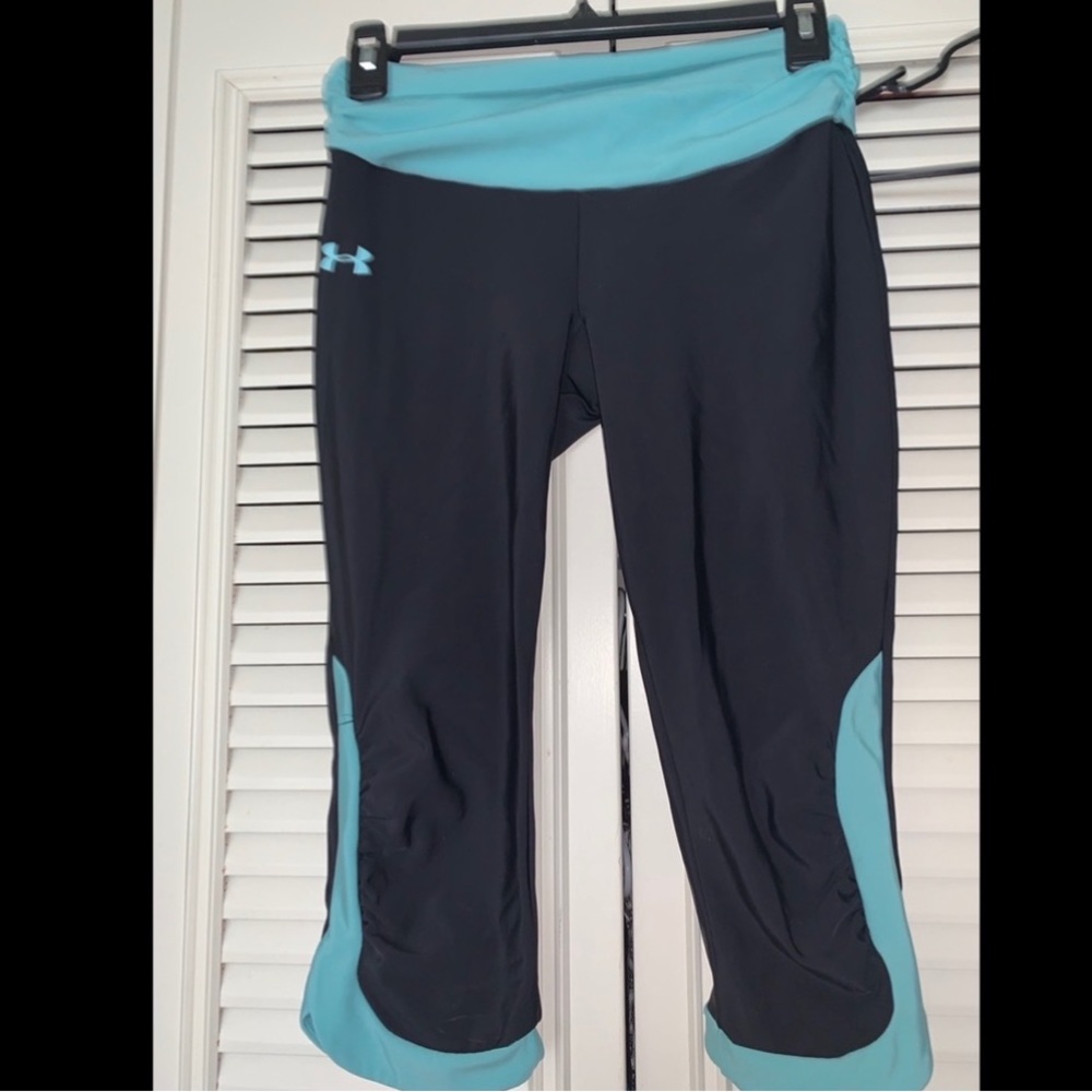 Two pairs of UA Heat Gear Capri Legging